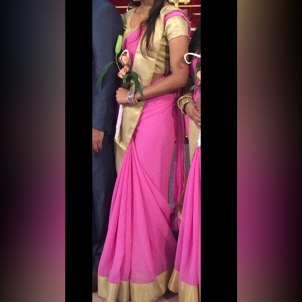 Pink saree with gold blouse